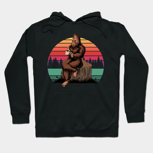 bigfoot drinking coffee Hoodie by Mako Design 